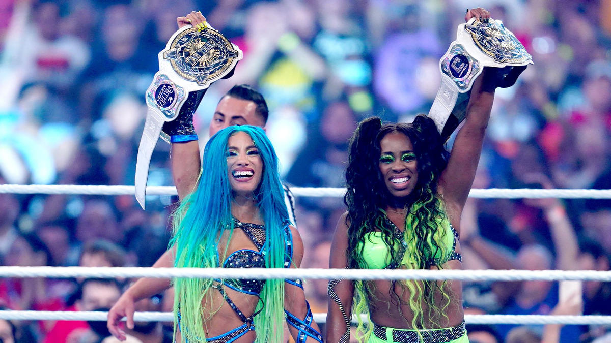 Sasha Banks and Naomi celebrate as WWE Women's Tag Team Champions at WWE WrestleMania 38: Night Two