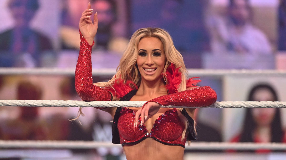 Carmella leaning on the ring ropes