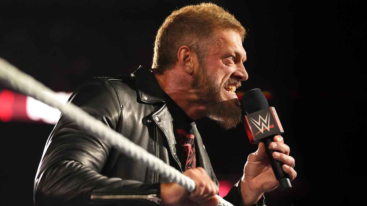 Edge on the mic in the ring