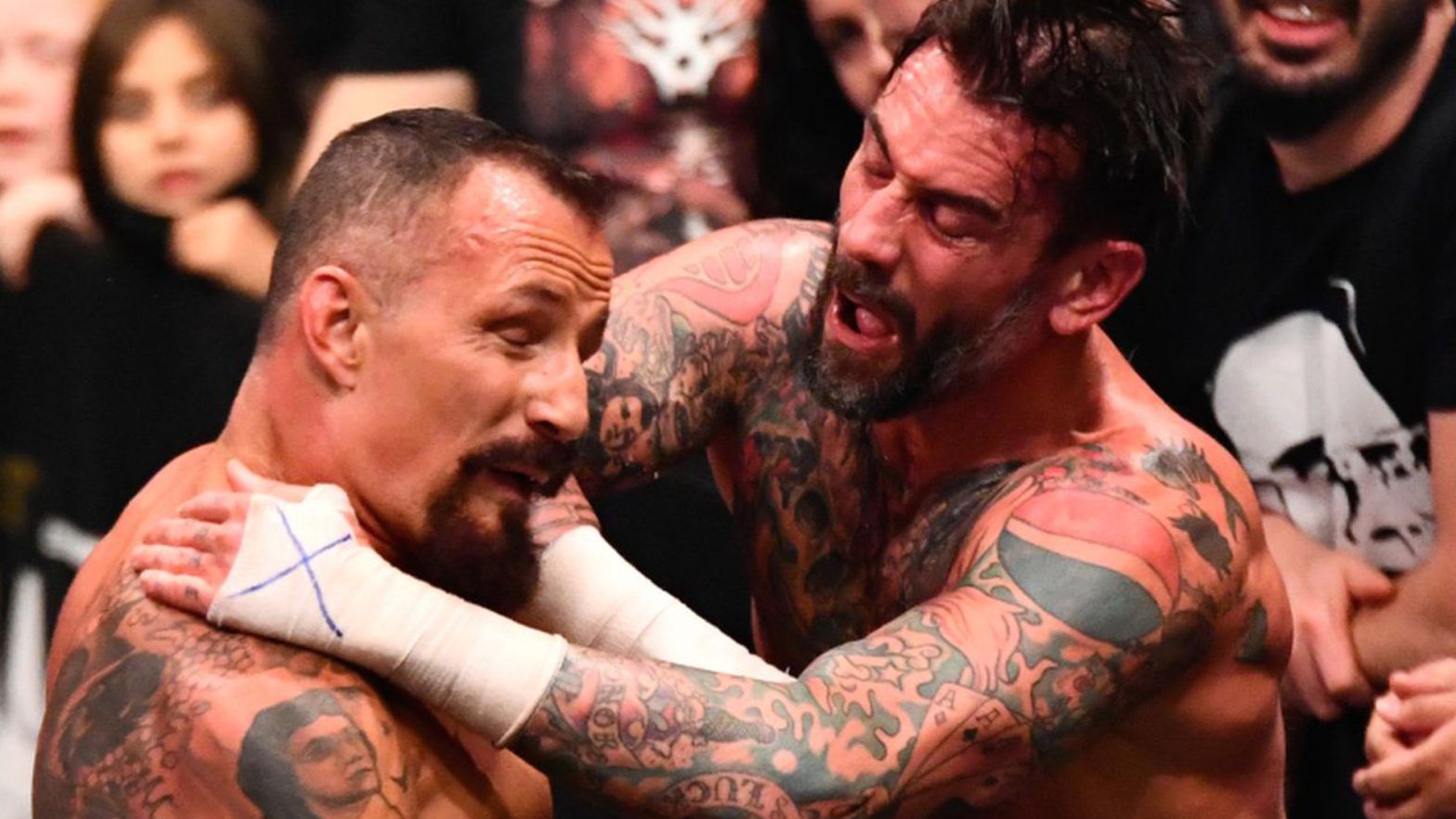 CM Punk elbowing Bobby Fish