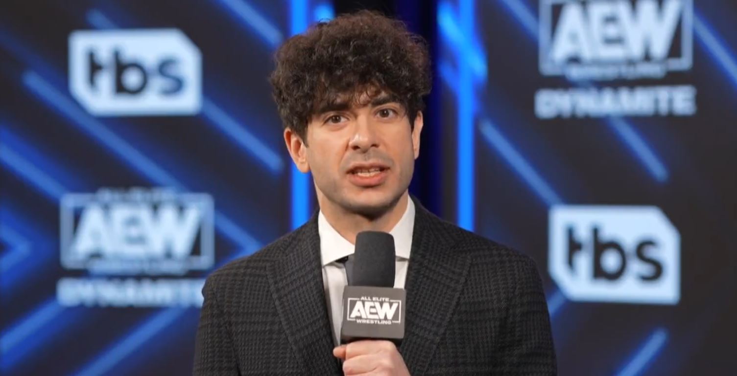 AEW President Tony Khan in front of a TBS background