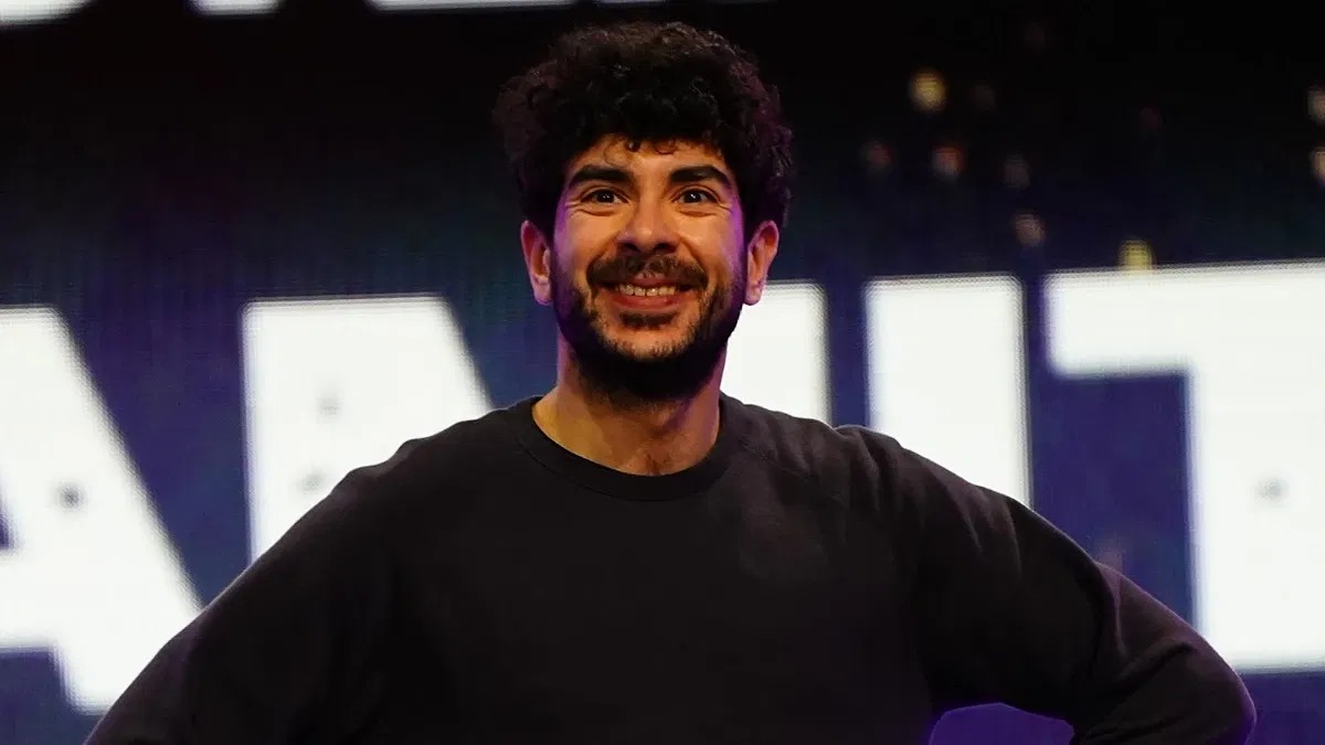 Tony Khan smiling to the camera on AEW Dynamite