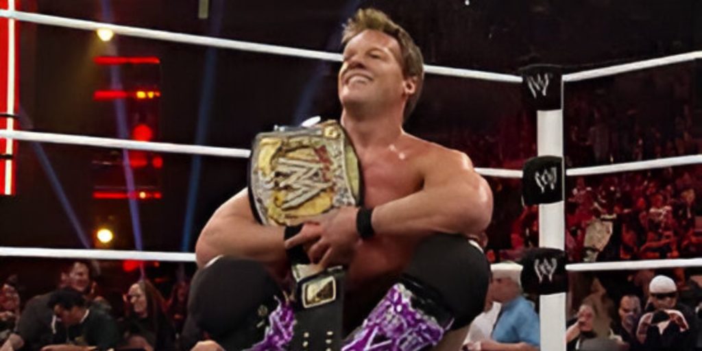 chris jericho holding cm punk's spinner wwe championship belt in 2012