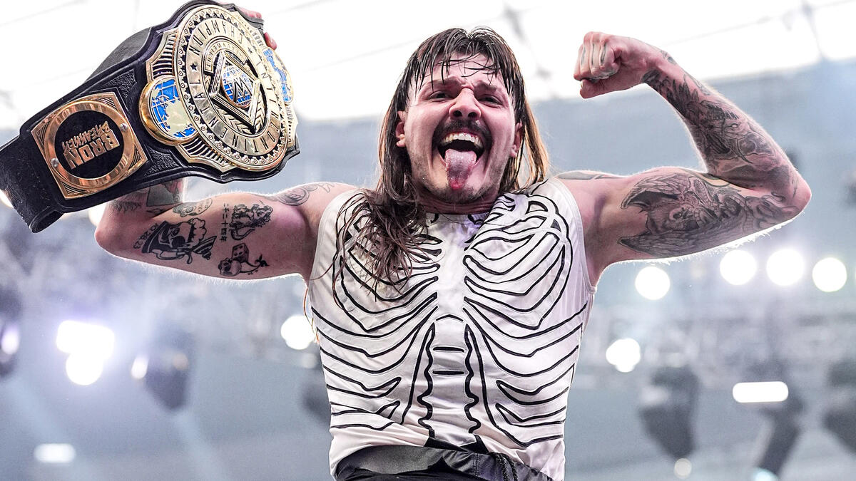 Dominik Mysterio posing with WWE Intercontinental Championship at WrestleMania 41