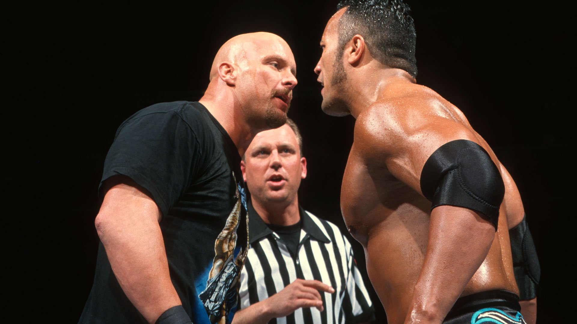 Steve Austin and The Rock face off at WWE WrestleMania 15