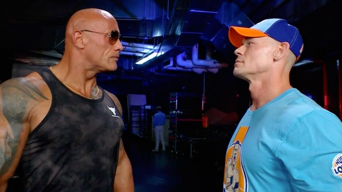 The Rock and John Cena backstage